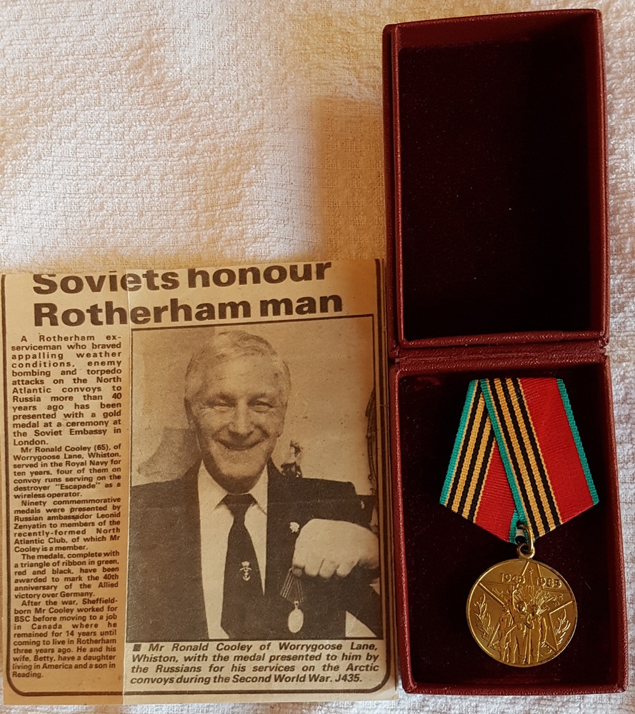 Mr Cooley receiving a commemorative medal for the 40th Anniversary of the Allied Victory over Germany