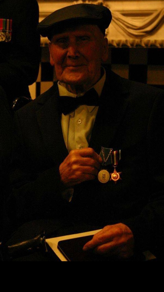 Frank receiving his Medal of Ushakov