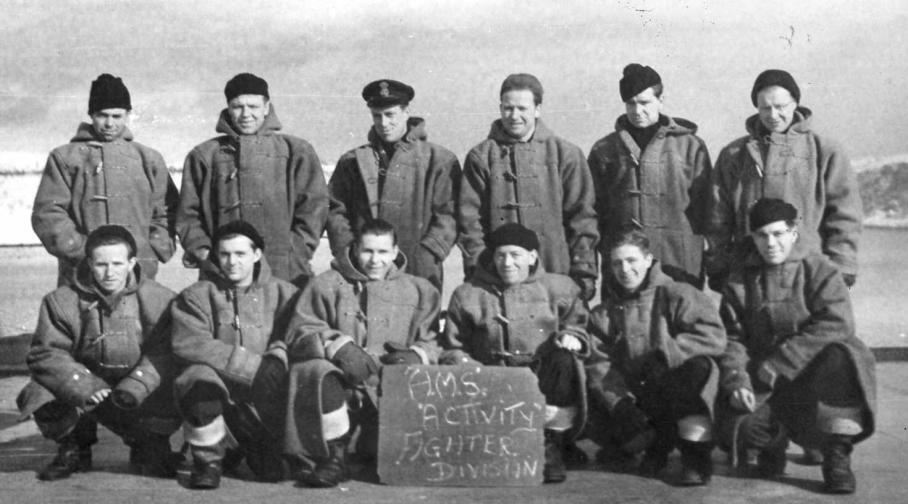 Group in front of the sign HMS Activity fighter division, taken in 1944 at the Kola Inlet, Murmansk. My father in law, Evan Roberts is back row, second from the left.