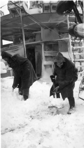 Clearing the deck on HMS Paynter 1942