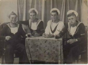 Taken at a studio in Alexandria to commemorate VJ Day, Thomas is the second from the left.