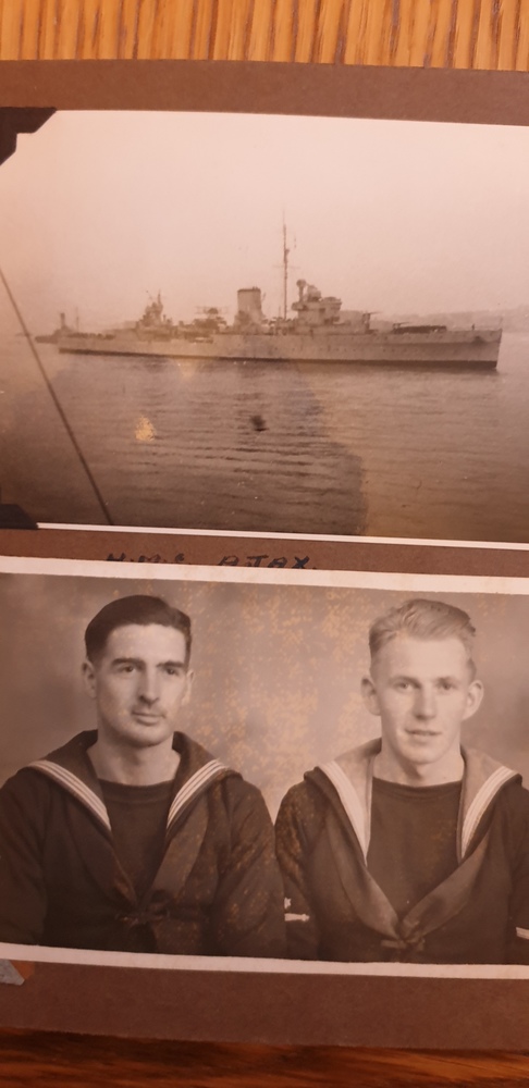 With unknown sailor and HMS Ajax