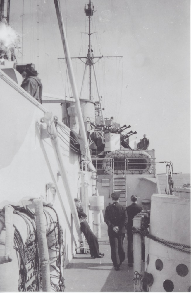 Leonard standing on the starboard quarterly deck