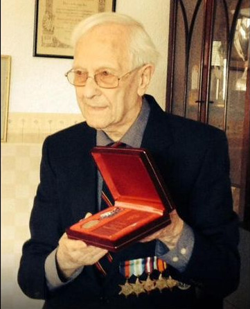 Receiving the Medal of Ushakov