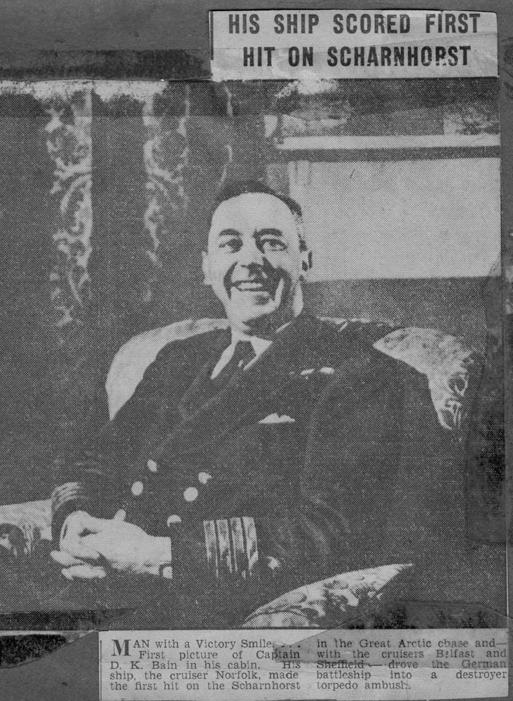 Contemporary Newspaper cutting of Captain D K Bain of HMS Norfolk, December 1943