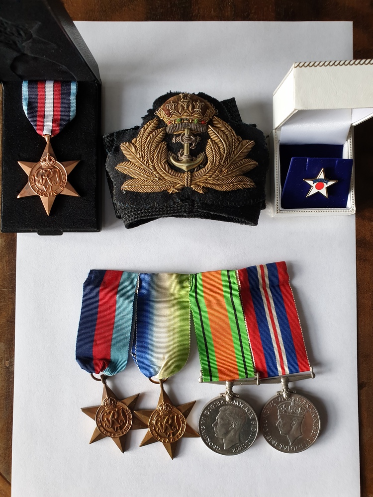 John McMurtrie's cap badge and medals