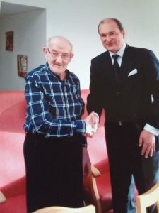 Thomas Lawson receiving his Medal of Ushakov from Russian Consul General Andrey Pritsepov.